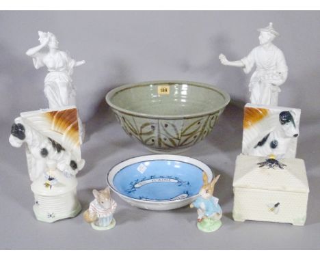 Ceramics, including; a pair of Worcester bisque porcelain figures, (a.f.) a large studio pottery bowl, a pair of bookends mou