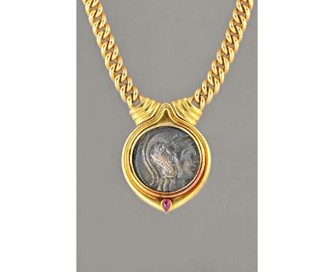 A Bvlgari gold collar necklace, the front mounted with a Greek coin above a pear shaped cabochon ruby, detailed to the back A