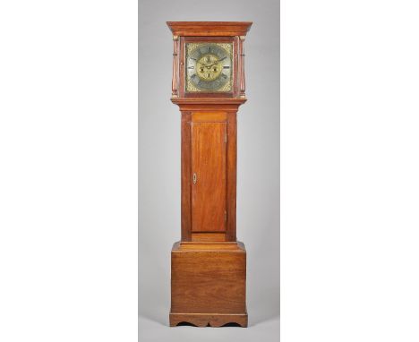A  mahogany longcase clockBy John Groom, Colchester, the movement circa 1710, the case laterThe moulded pediment, above a pai