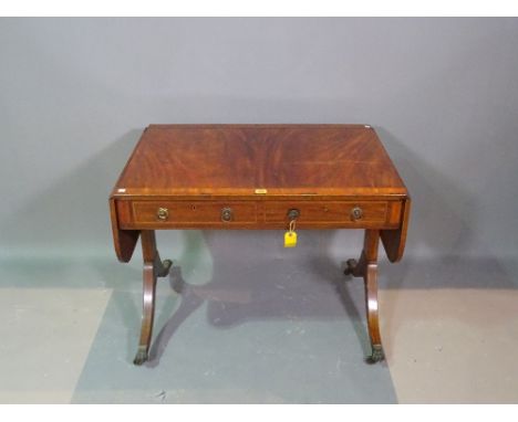 A George III mahogany sofa table, 88cm wide x 70cm high. 