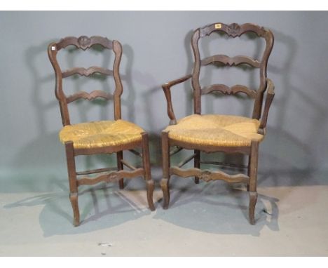 A set of  four French ladder back dining chairs and an ash and elm wheelback chair, (5).