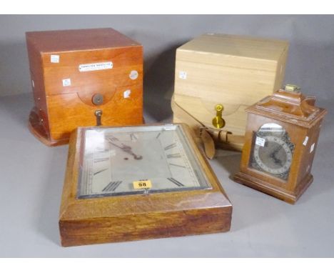 Horological interest, including; a walnut mantel clock, J.J.Jones, a wall clock and two chronometer boxes, (4). 