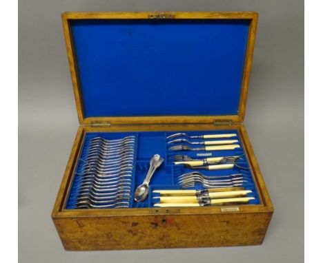 A plated double struck fiddle and thread pattern part table service, comprising; twenty-eight tablespoons, seventeen dessert 