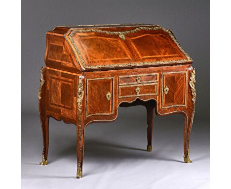 A 19th century ormolu mounted kingwood bureau, the caddy top with stepped and welled interior, with single frieze drawer flan