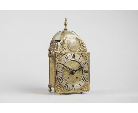 A brass lantern clockInscribed William Kipling, LondonSurmounted by a finial and bell, above the 8 in. arched brass dial insc