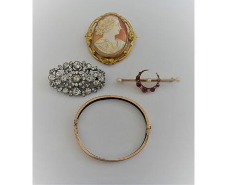 A gold, ruby, diamond and cultured pearl brooch, designed as a crescent on a bar, a Victorian 9ct gold oval hinged bangle, on