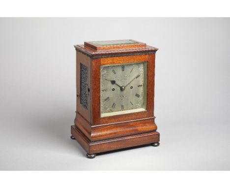 A Victorian mahogany mantel clockBy James McCabe, London, No. 2519The case with a stepped pediment inset with a bevelled glas