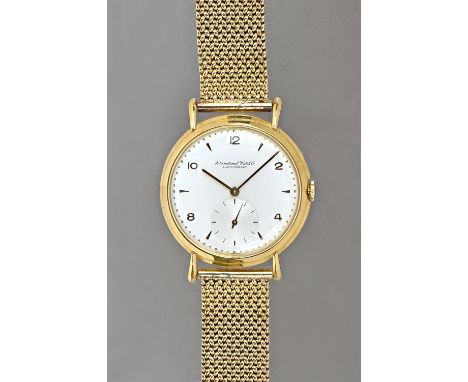 An International Watch Company Schaffhausen gold circular cased gentleman's wristwatch, circa 1947, the signed jewelled lever