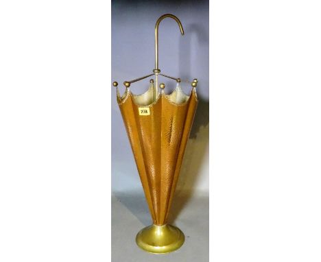 An early 20th century beaten copper stick stand formed as an umbrella, 78cm high. 