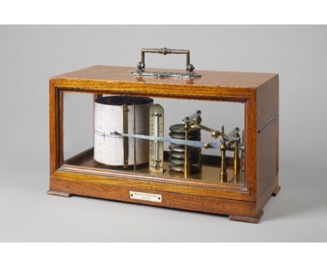 An oak cased barographBy Negretti & ZambraCirca 1900The rectangular case with a brass carrying handle and three glazed sides,
