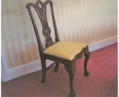A Set of Ten Mahogany Chippendale Style Dining Chairs. Circa 1800. Each with an openwork fret back, cabiole legs with cloaw a