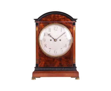 An early 20th-century mahogany cased twin fusee 8-day bracket clock, with an arched top, fitted a silvered Roman dial indicat