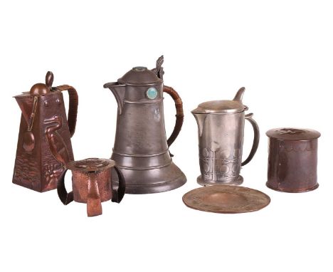 A collection of decorative Arts and Crafts metalware, comprising a large pewter lidded jug, inset with cabochon enamels, 21 c