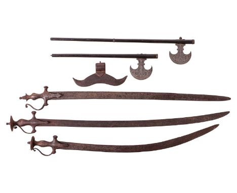 Three 19th-century Indo-Persian Tulwars 94 cm the longest, together with two ceremonial Taba (axes) with Damascened crescent 