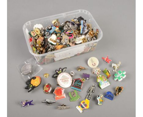 A large collection of pin badges, including enamel examples.  