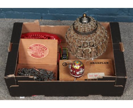 One box of assorted items. To include Merinos cigar case containing soldier figures, retro dial telephone, light fitting and 