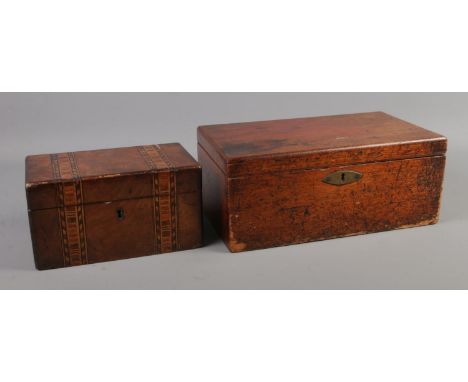 A Victorian mahogany tea caddy, together with a mahogany box with three removable trays. Box stamped W Edwards Camden Town.  