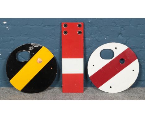 Three railway enamel signal signs, including two circular examples.  Enamel chipped on black and yellow example.