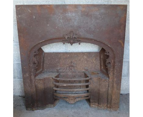 A large Victorian cast iron fireplace with floral decoration. (113cm x 102cm)  