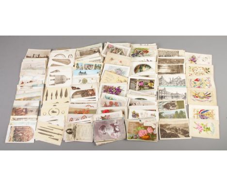 A quantity of vintage postcards, focusing on topics including The Royal Family, Museum Exhibits and War and Ships.  