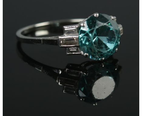 An art deco 18ct White Gold blue zircon and diamond ring. Size MÂ½. Total weight: 2.8g.  