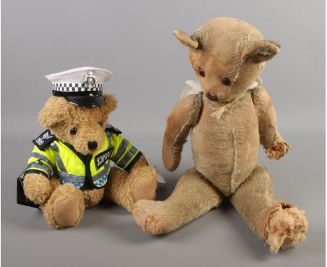 A vintage jointed bear, together with a British Teddies 'Traffic Bobby'.  Foot deteriorating and head loose on jointed exampl
