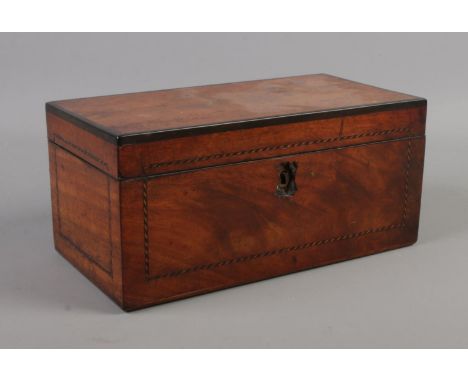 A Victorian mahogany tea caddy. (24cm width 11.5cm height)  