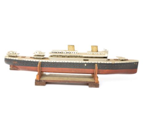  A partly completed large scale wooden model of a two funnel Liner,  painted in white, red and black, requies finishing, pres