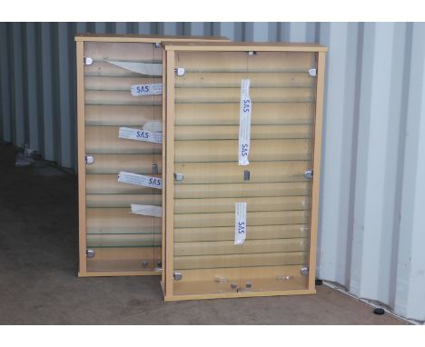 A pair of 'portrait' wall mounted Display Cases, constructed in wood, laminate and glass, each 110cm high, 66cm wide x 20cm d