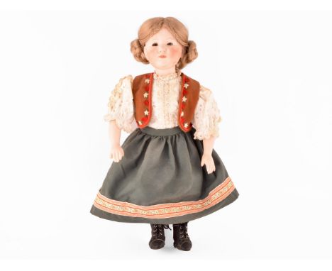 A Kammer &amp; Reinhardt German bisque doll in traditional dress, numbered 101, marked R198, 47 cm.