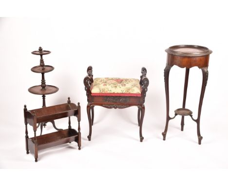 A small group of furniture including a three tier mahogany cake stand with tripod base, a Victorian carved&nbsp;mahogany pian