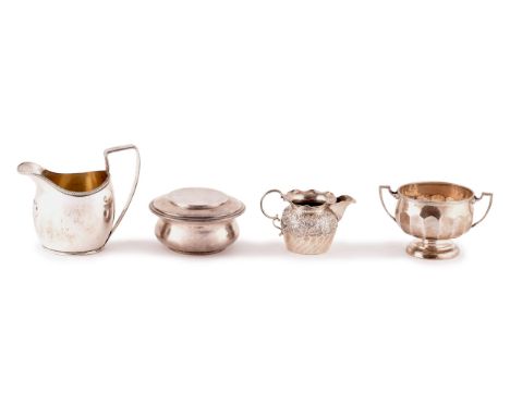 A Group of silver items, including two jugs, one hallmarked for Birmingham&nbsp;1892 by&nbsp;Nathan &amp; Hayes, the other un