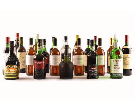 A group of assorted wine and spirits, including a 1997 Duc de Rachelle Claret Bordeaux, a 1981 Chateau Lamothe-Cissac, Jacobs