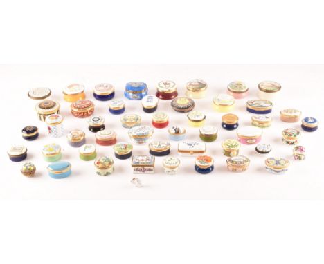 A large collection of enamel pill boxes of varying shapes and sizes, maker's including Royal Worcester, Crummles &amp; Co, St