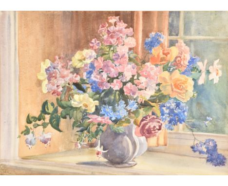 A watercolour still life study of various flowers in a vase sitting on a windowsill, signed to lower left 'A.K.', 39 x 54 cm.