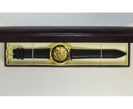 A Gents Gold Plated Skeleton Wristwatch In Mint Condition with New Good Quality Leather Strap In a Fitted Case, Manual Wind, 