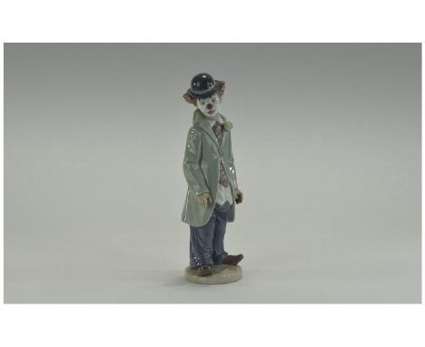 Lladro Figure "Circus Sam" Model number 5472, Issued 5472, height 8.5" inches. Slight damage boxed. 