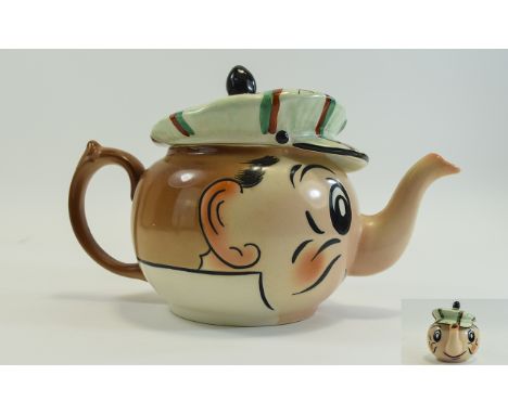 Wade - Hand Painted Novelty Teapot In The Form of Andy Capp. 5.75 Inches High, 9 Inches Wide. Excellent Condition, No Chips, 