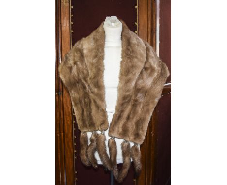 Light Brown Mink Stole with Tail Detailing Good quality Mink stole with shawl collar and brown satin jaquard lining, unusual 