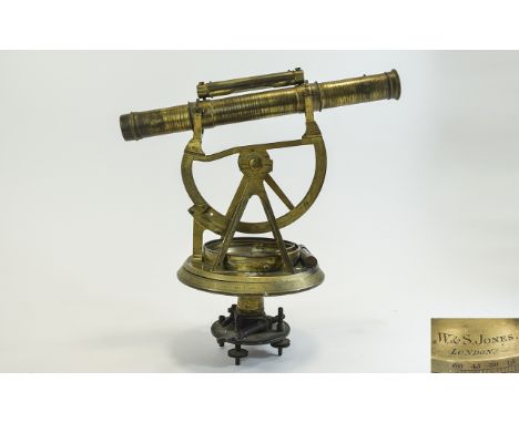 Brass Surveyor's Theodolite By WS Jones London. The brass and gilt brass level has a rotating circular base with thumbscrew a