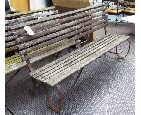 CRICKET BENCH, Early 20th Century wrought iron with weathered slat seats, 183cm W.