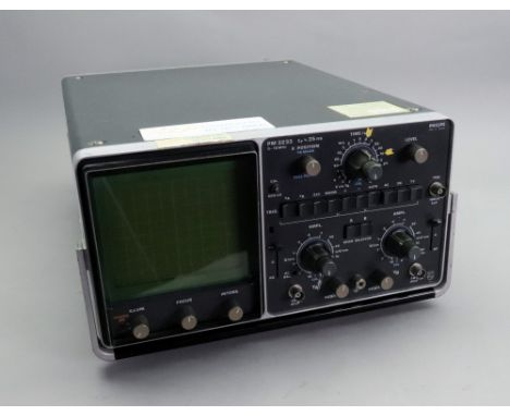 Philips PM 3233 Oscilloscope, serial no. DO-10, with instruction manual.