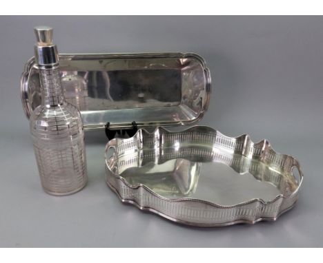 An overlaid glass decanter, probably American, detailed sterling, with a repeated design of rectangles, 29.5cm high, an elect