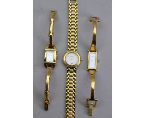 Gucci; a lady's 6800L stainless steel quartz wristwatch, the rectangular mother of pearl dial detailed 'Gucci' with baton mar