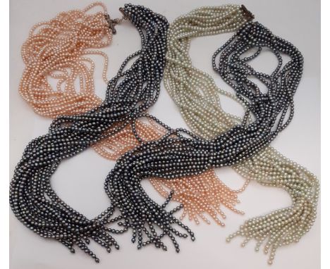 An interchangeable pearlized scarf of beads together with a Penhaligon's burgundy leather caseLocation:BWRIf there is no cond
