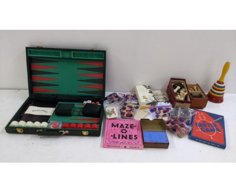 A mixed lot of games to include a chess set, playing cards, backgammon set and other itemsLocation:If there is no condition r