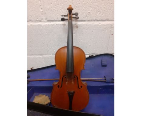 A reproduction Antonius Stradivarius violin with bow and accessories in a fitted case, back length 36cm, total length 60cm. L