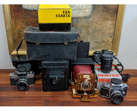 Camera and photographic accessories to include a Thornton special Ruby Reflex, The Sanderson camera, Exakta RTL 1000, an Exak