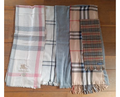 Four wraps and 1 scarf in a tartan design, 2 in the style of a British fashion designerLocation:RAFIf there is no condition r