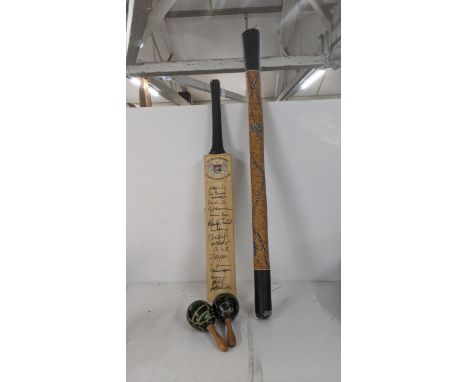 A signed Gloucestershire County cricket club cricket bat, together with a pair of maracas and a didgeridooLocation:If there i